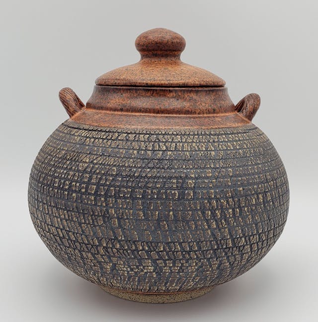 Rustic charcoal brown urn